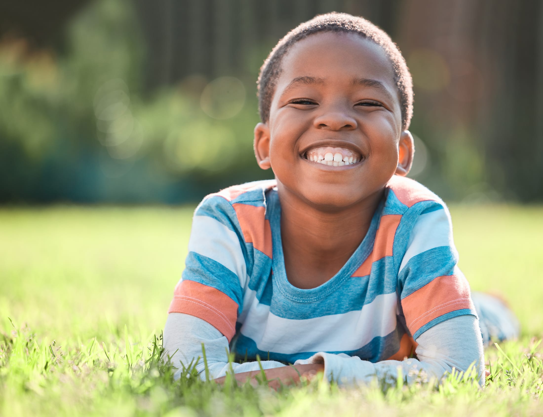 Child smiling at a dental appointment