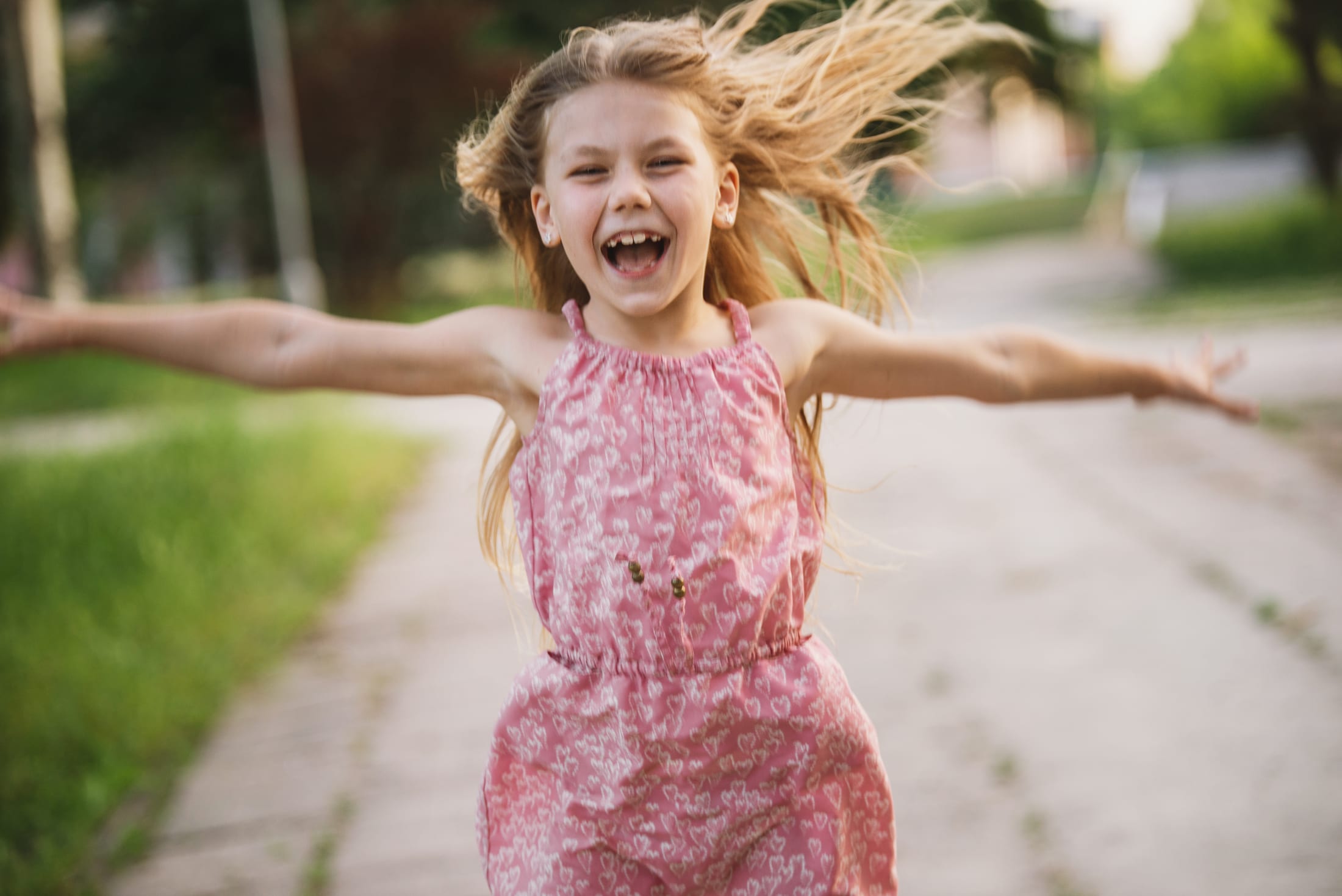 Child smiling while learning about dental health