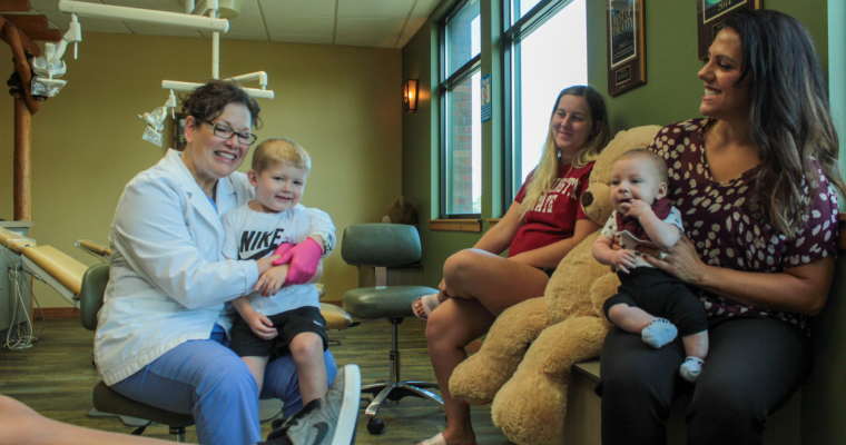 Mothers sitting in the waiting room and talking to our specialist